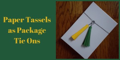 Paper tassels tied onto a gift box