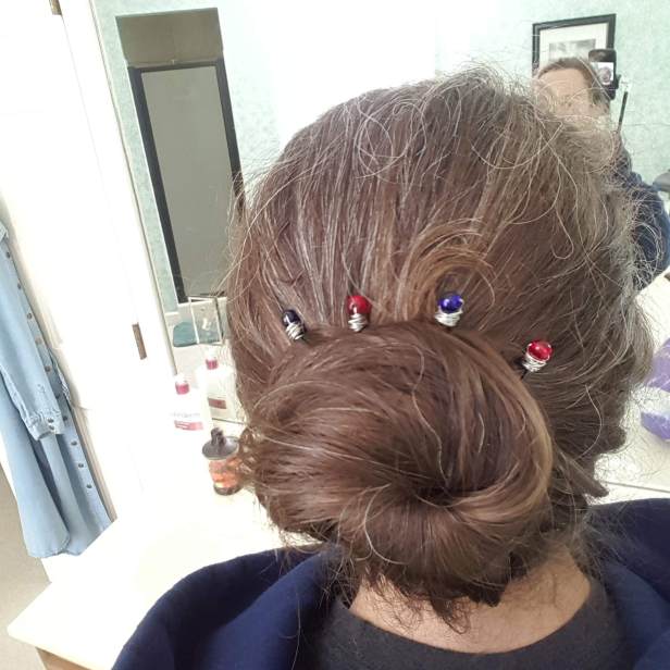Messy bun with DIY beaded bobby pins